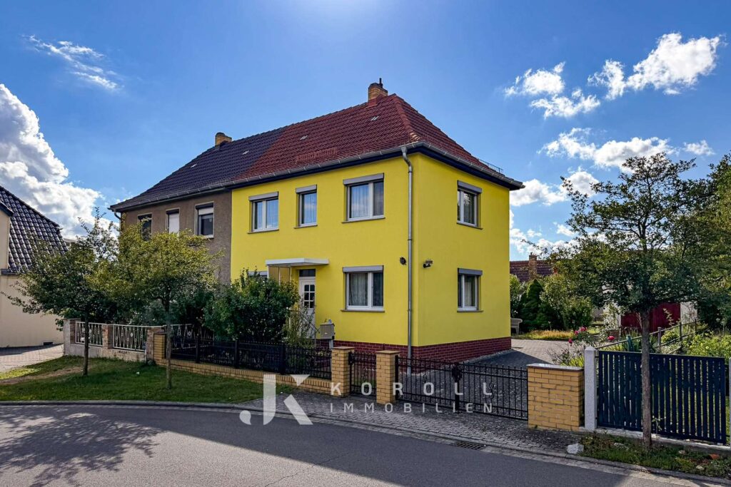 Ihr neues Zuhause mit Entfaltungsmöglichkeiten: Solides Doppelhaus mit Garten und Nebengelass